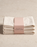 Clean Slate Cleansing Cloths — folded ivory cloths with band