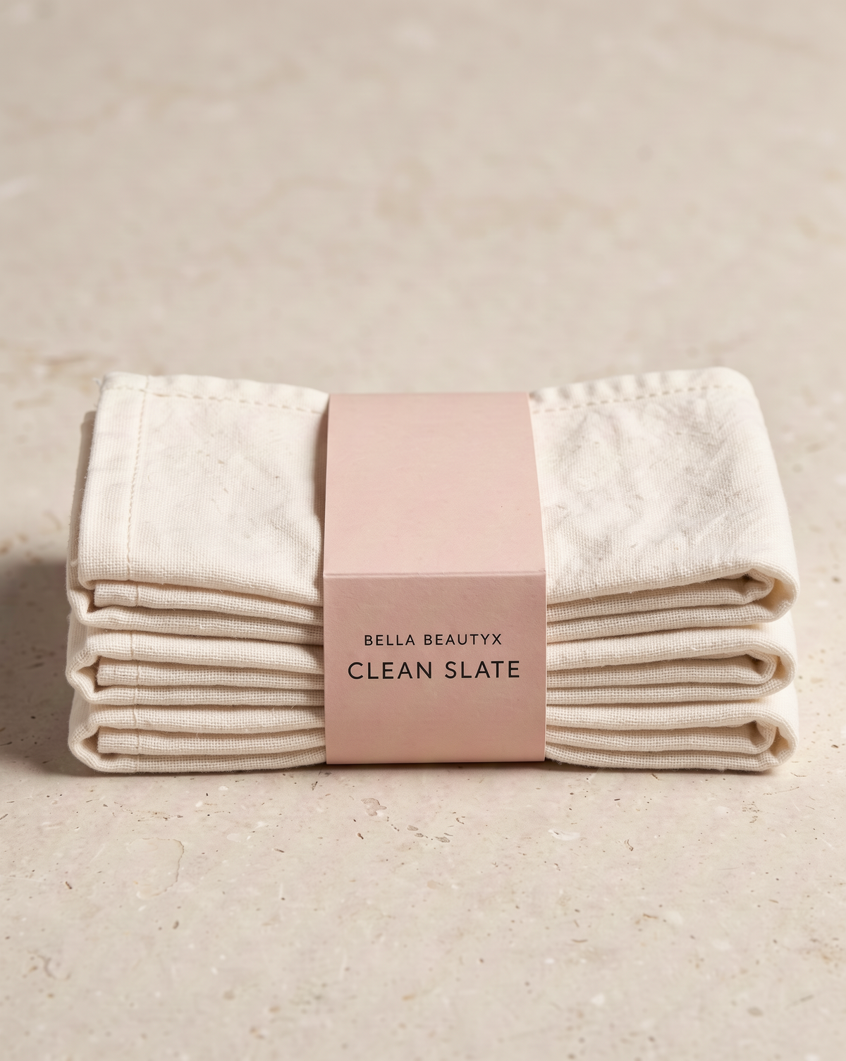 Clean Slate Cleansing Cloths — folded ivory cloths with band